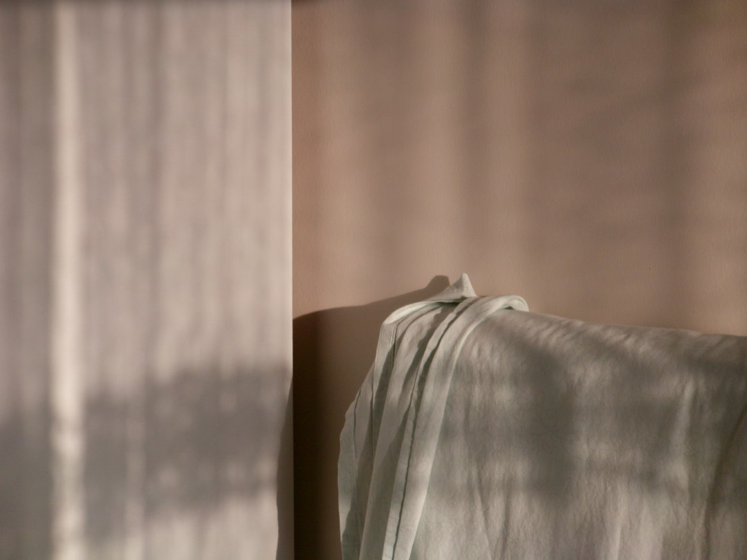 Soft fabric with warm natural light and gentle shadows